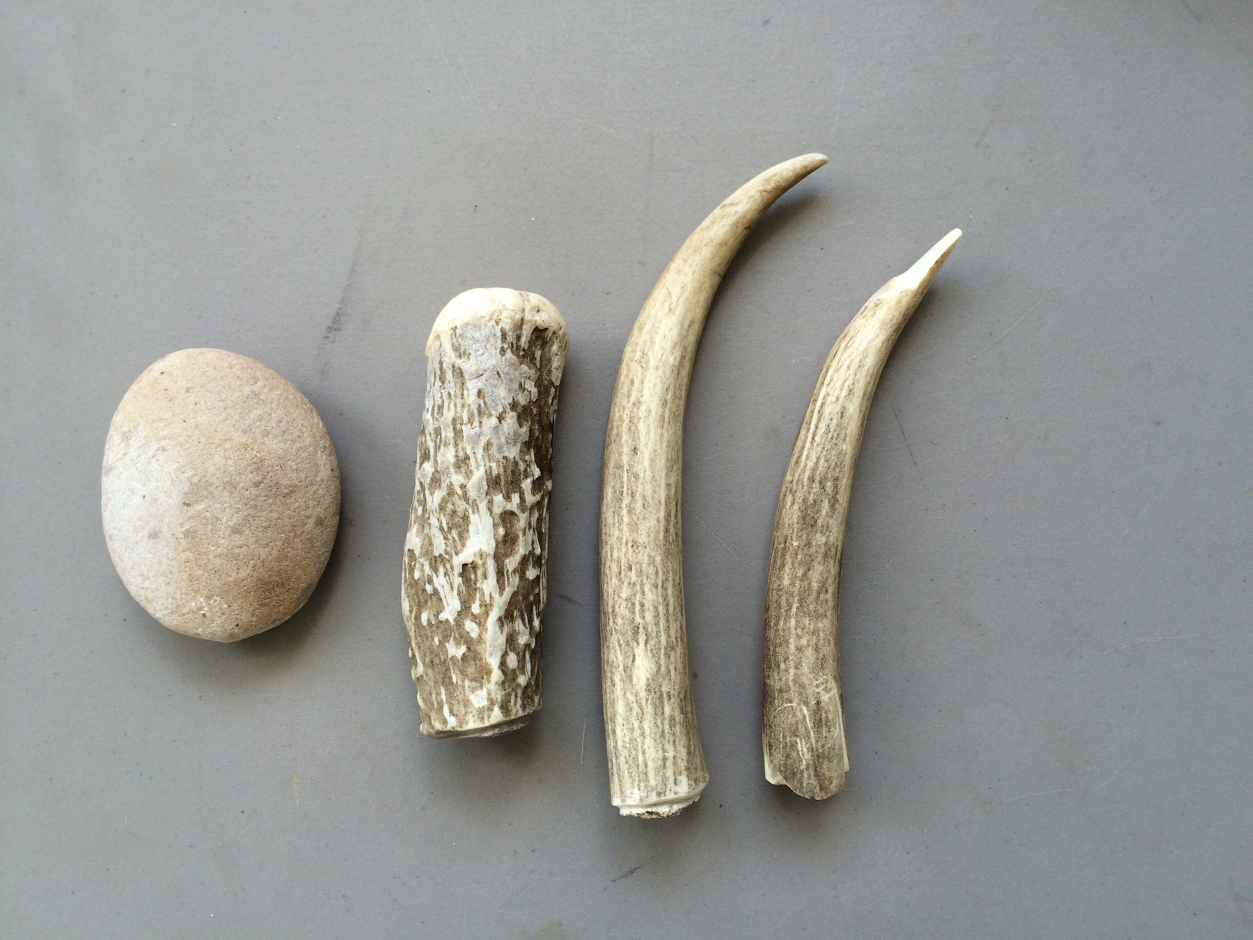Flint-knapping tools: a. worked antler pressure flaker; b-e
